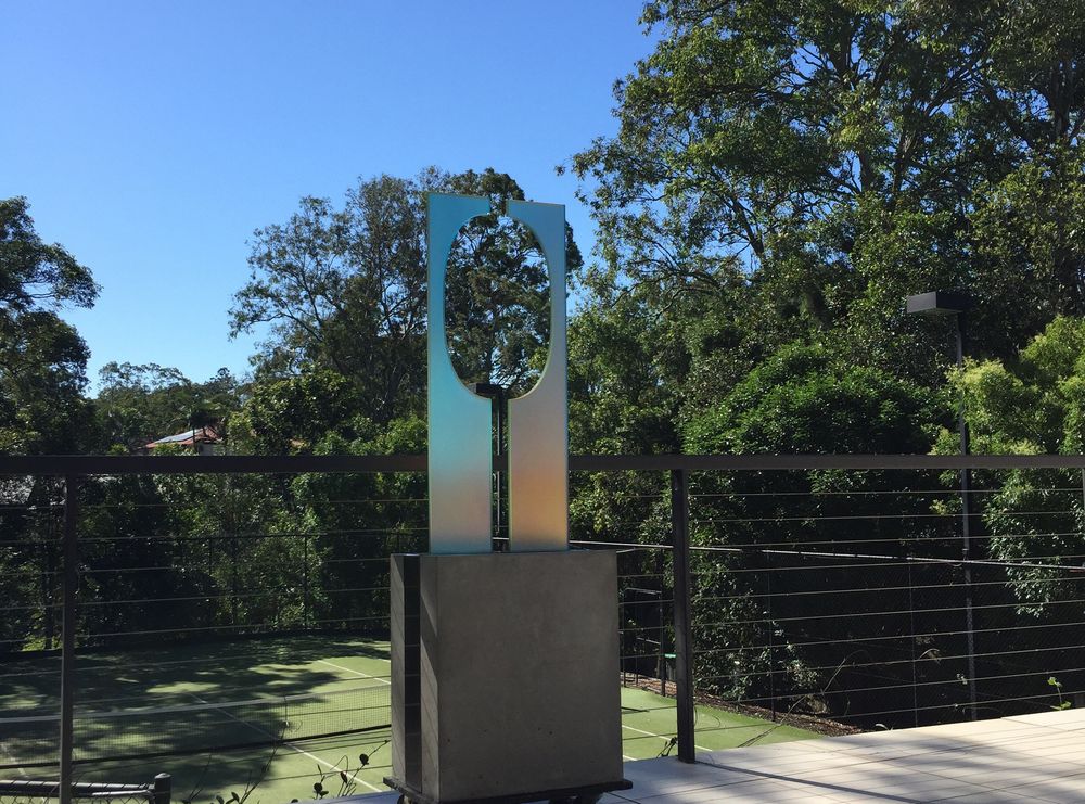 Dichroic Glass sculpture Fire & Ice installed at the home its new owner.